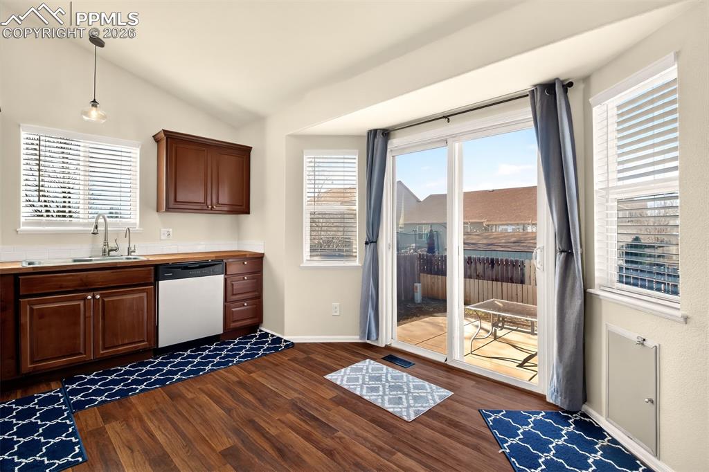 Walk out from kitchen to back patio