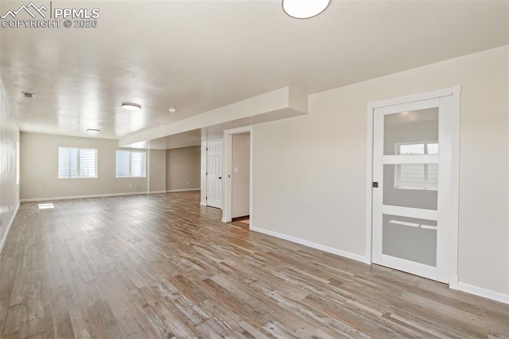 Empty room featuring light wood-style floors