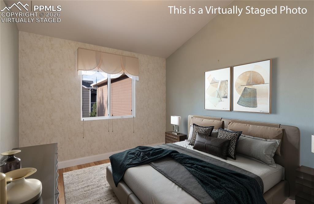 Virtually Staged Photo - Main-level bedroom