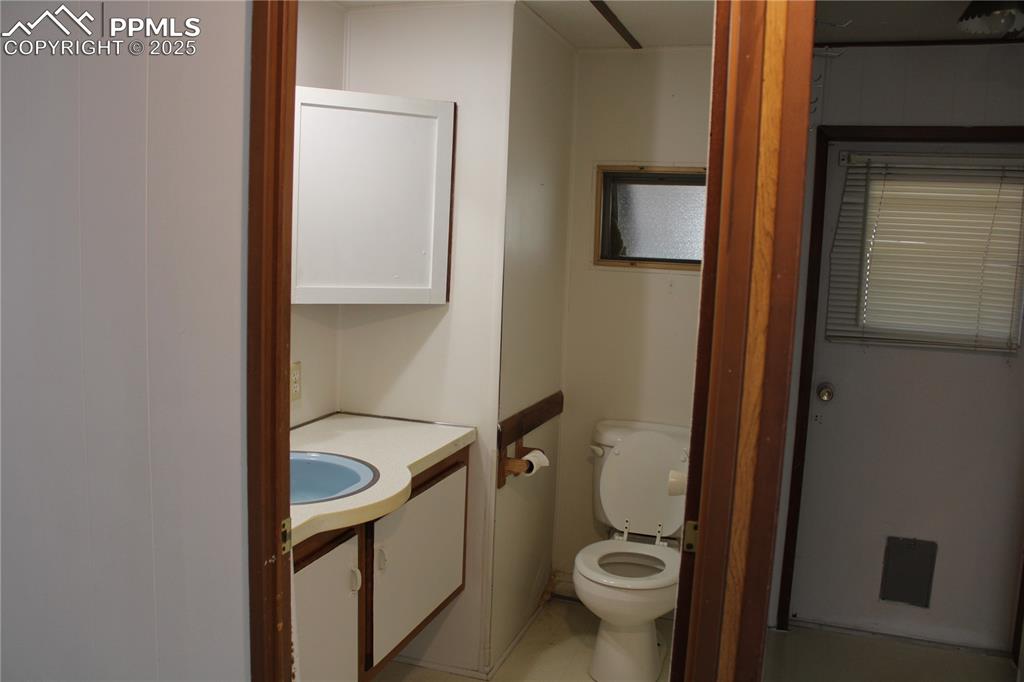Bathroom with vanity and toilet