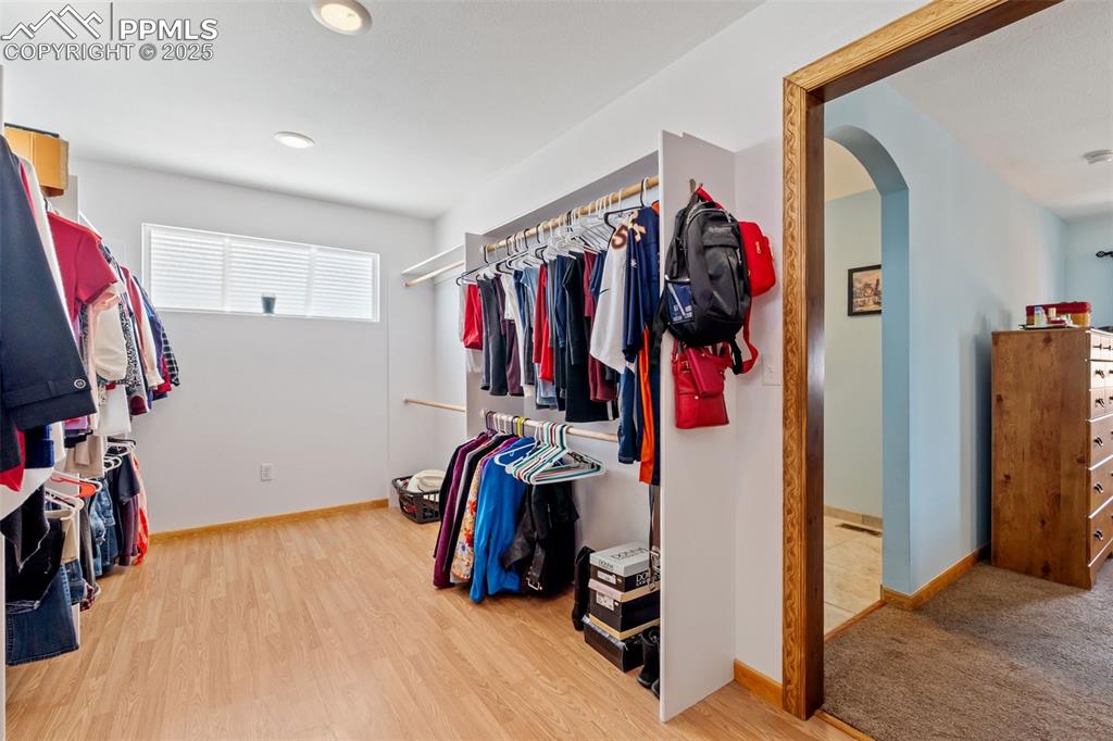 Massive walk-in closet with built-in organization