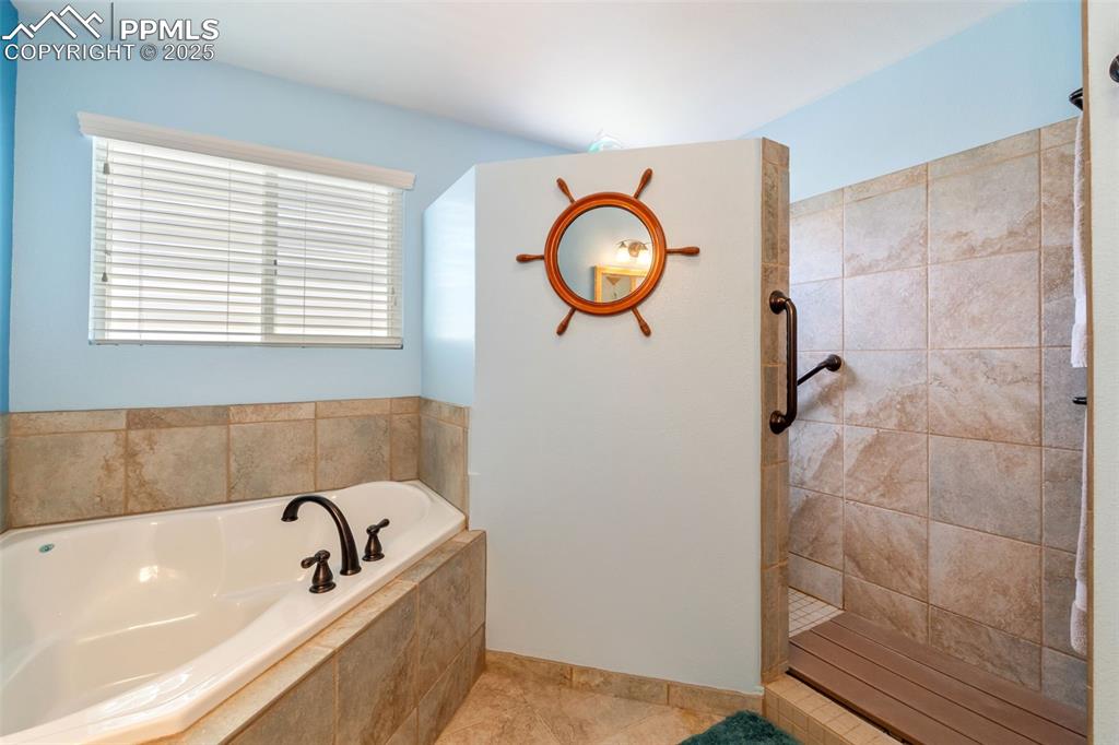 Luxury tiled walk-in shower with modern finishes