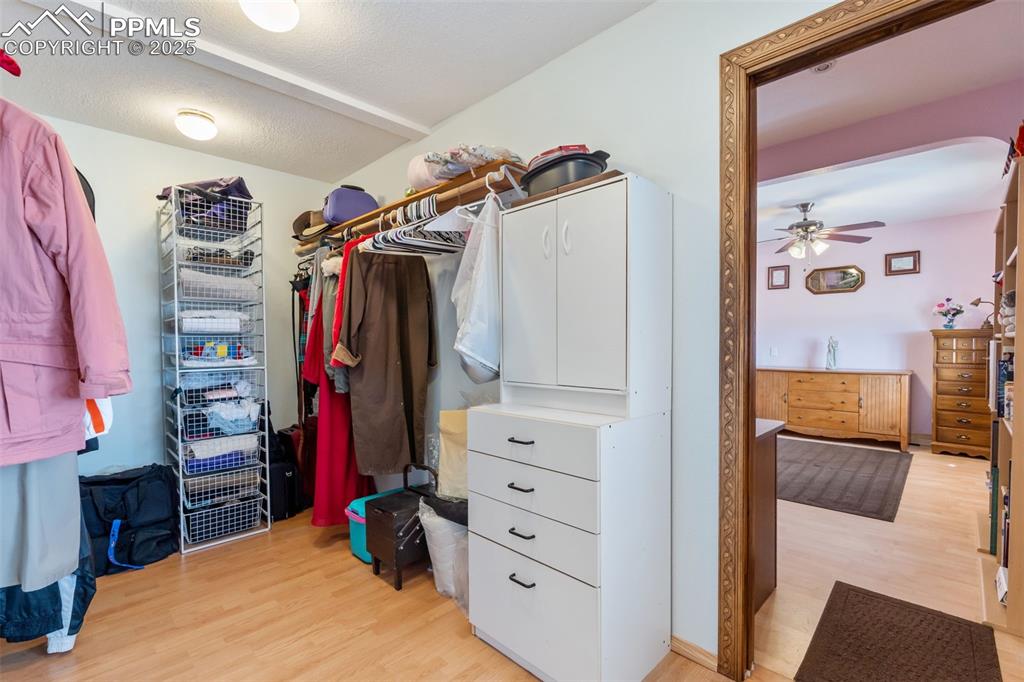 Large walk-in closet with ample storage