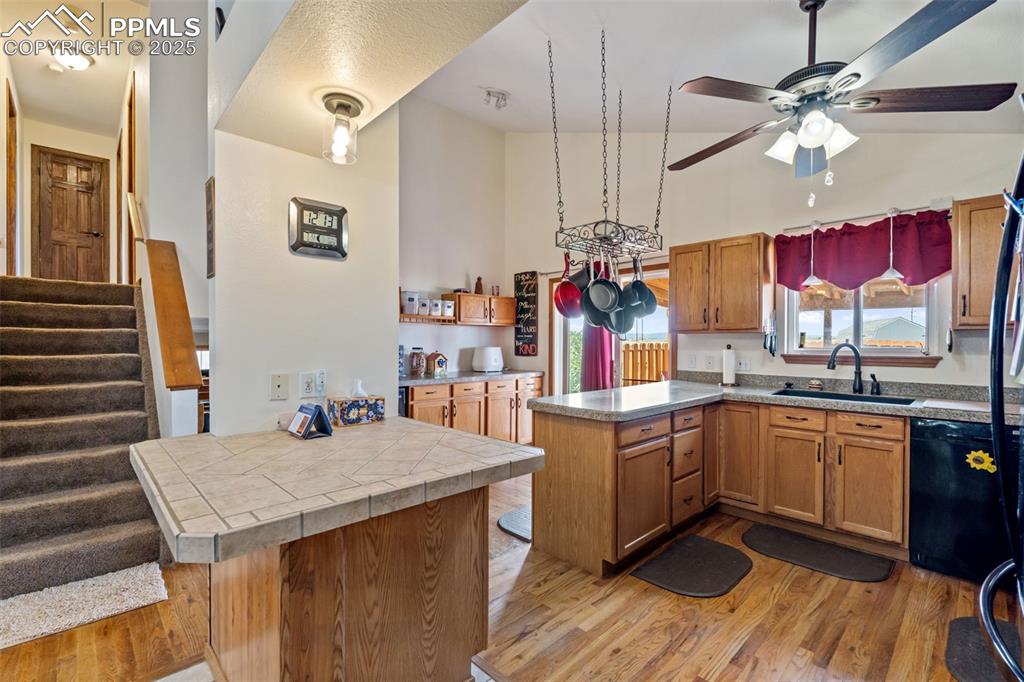Spacious kitchen with breakfast bar and vaulted ceilings