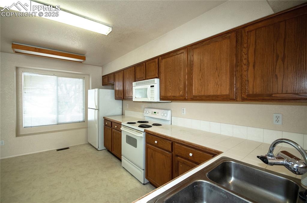 Kitchen as viewed from the counter bar