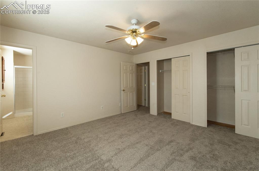 Primary or Master bedroom offering plenty of closet space and adjoining bathroom