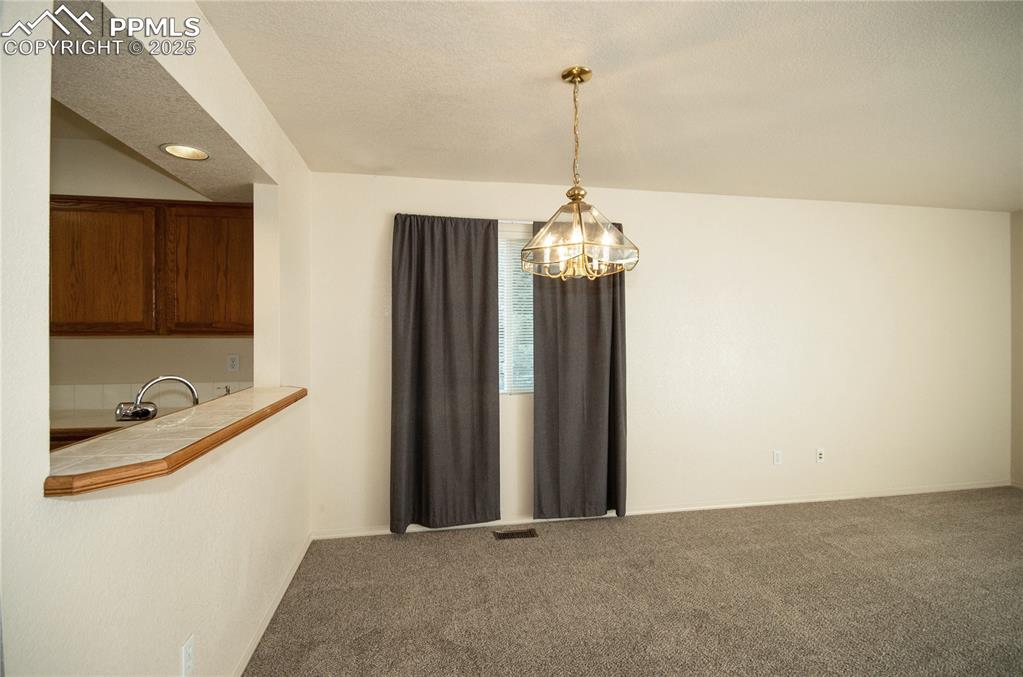 Dining area with countertop bar to the kitchen