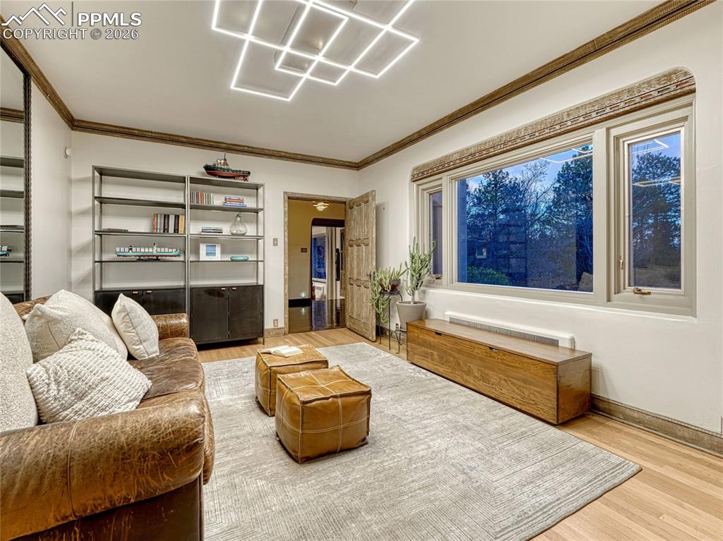 Informal dining space/office/lounge area connected to kitchen.