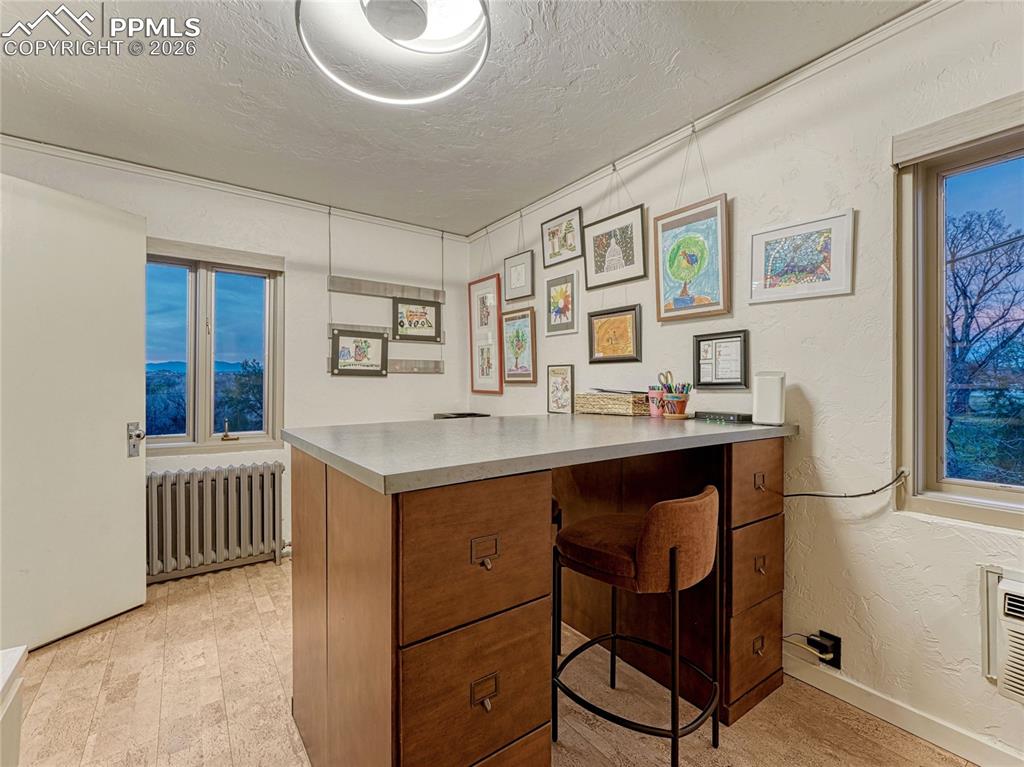 Bedroom/office on main level w/built-ins plus closet space and private bath.