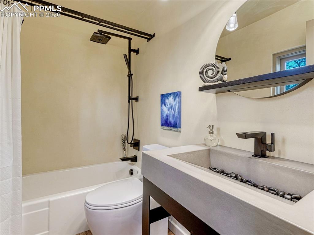 Main level bedroom/office w/private bath.