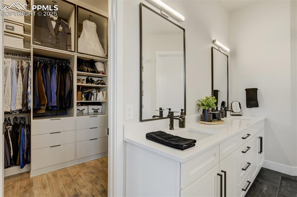Master closet designed by California Closets