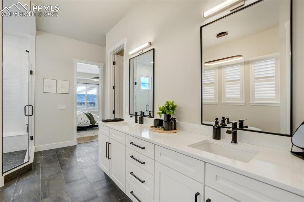 Master bath featuring large shower w/seat, freestanding soaking tub, double vanity, and separate water closet