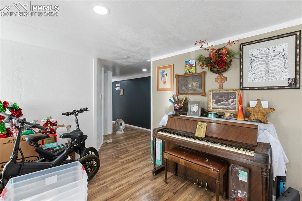 The living area with wood finished floors!