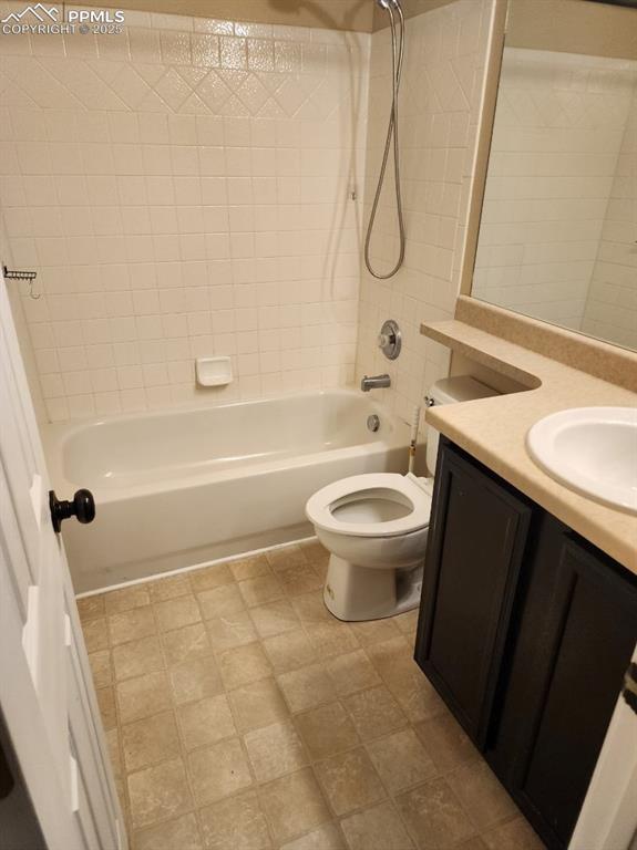 Full bathroom with shower / bathtub combination and vanity