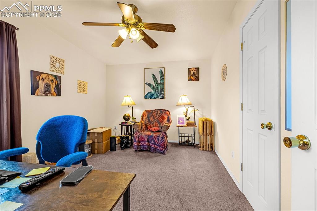 ADU Office space/Bedroom 1 featuring carpet and a ceiling fan