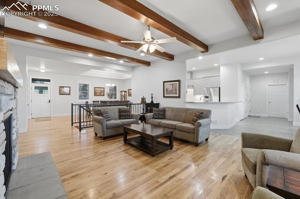 This home is bright and inviting thanks to oversized widows, recessed can lighting, beautiful light fixtures and an open floor plan. 