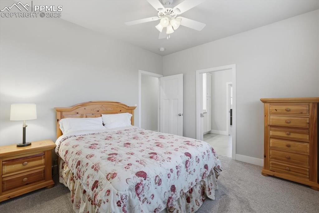This second of three main-floor bedrooms is spacious and has an adjacent bath. 
