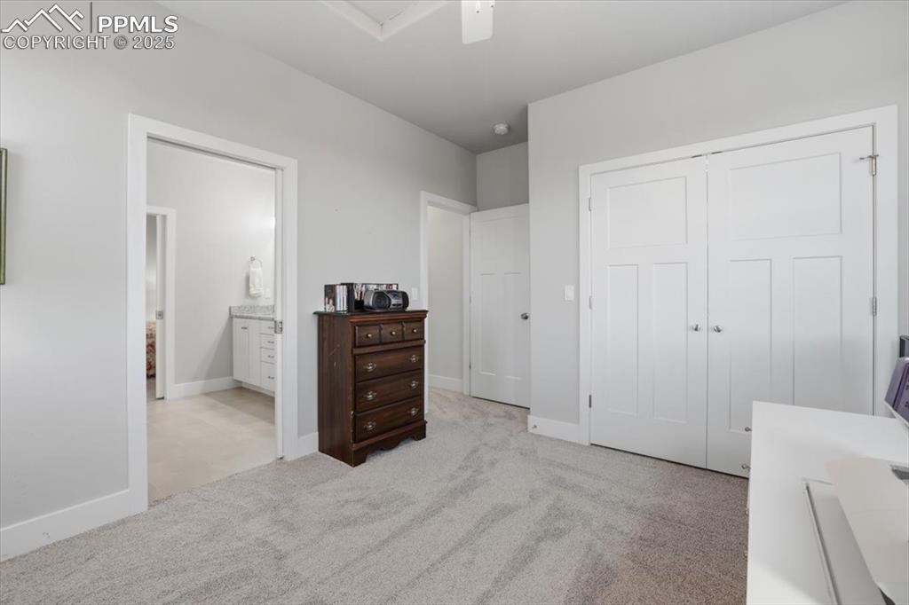 The third main-floor bedroom has a double closet and an adjacent bathroom. 
