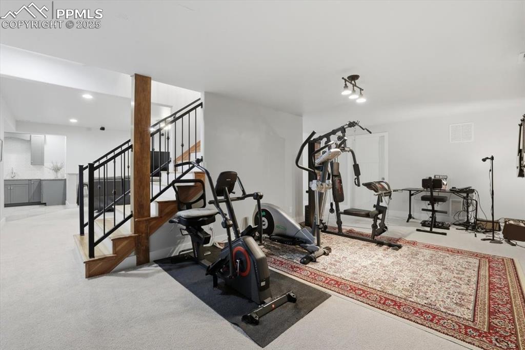 This area off the basement family room is currently in use as a home gym. 