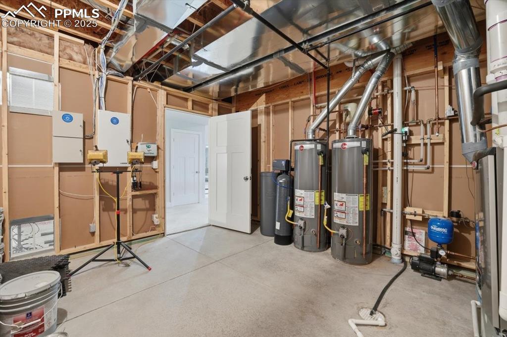 The spacious mechanical room has even more room for storage in the basement. 