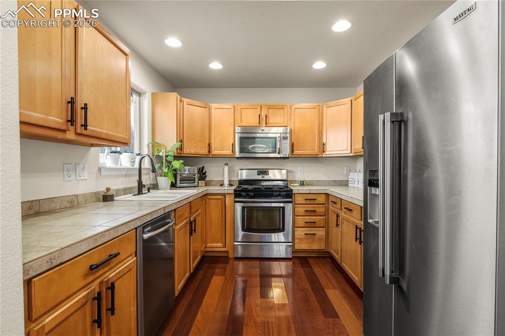 Additional view of the kitchen.