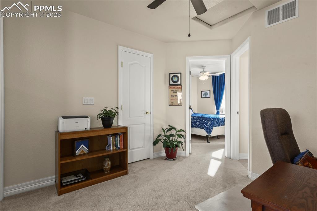 Upper level loft/office, view of 2nd bedroom.