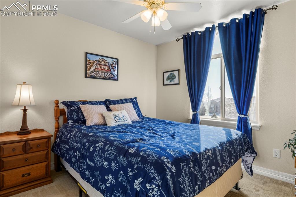 Upper level 2nd bedroom with walk-in closet.