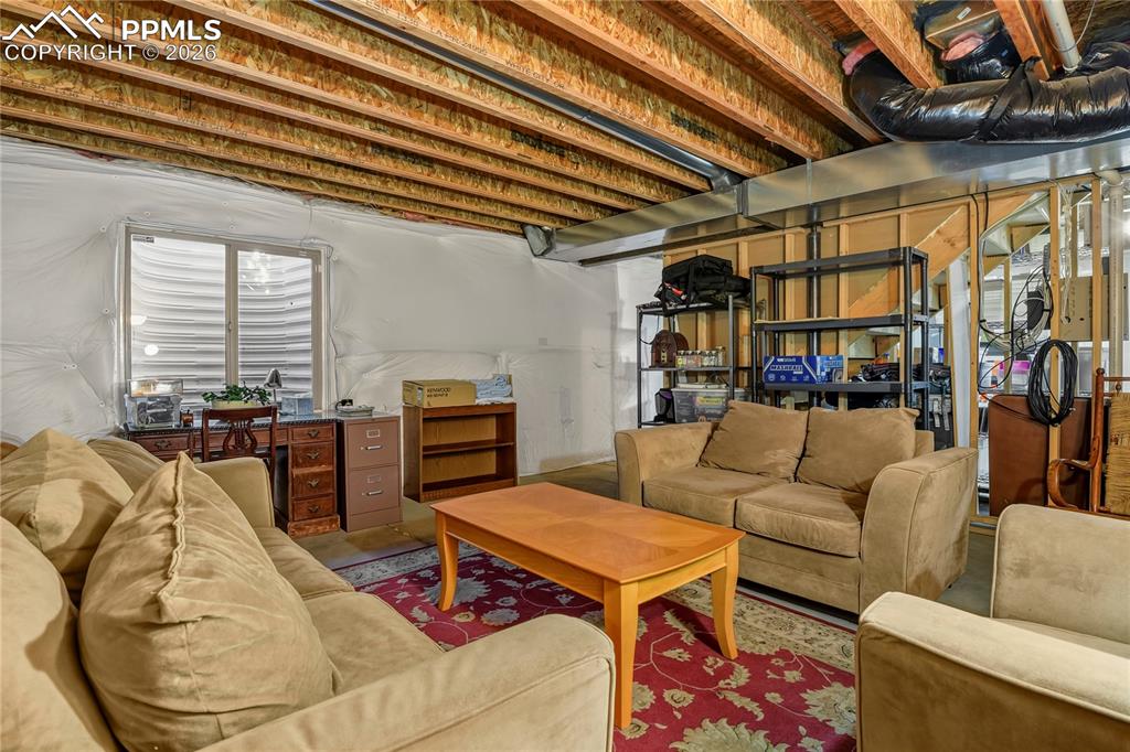 Unfinished basement area. Stubbed in for additional bathroom.