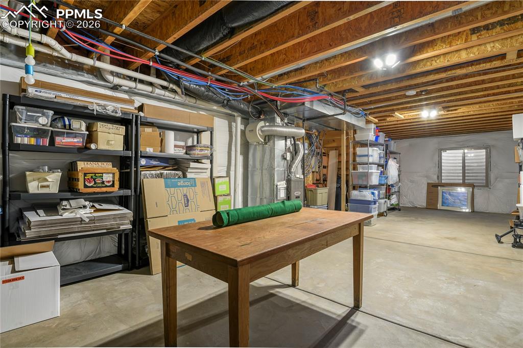 Additional view of the unfinished basement.