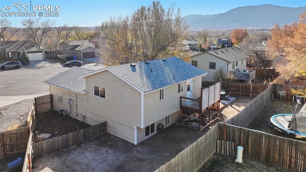 Aerial perspective of area with a mountain backdrop