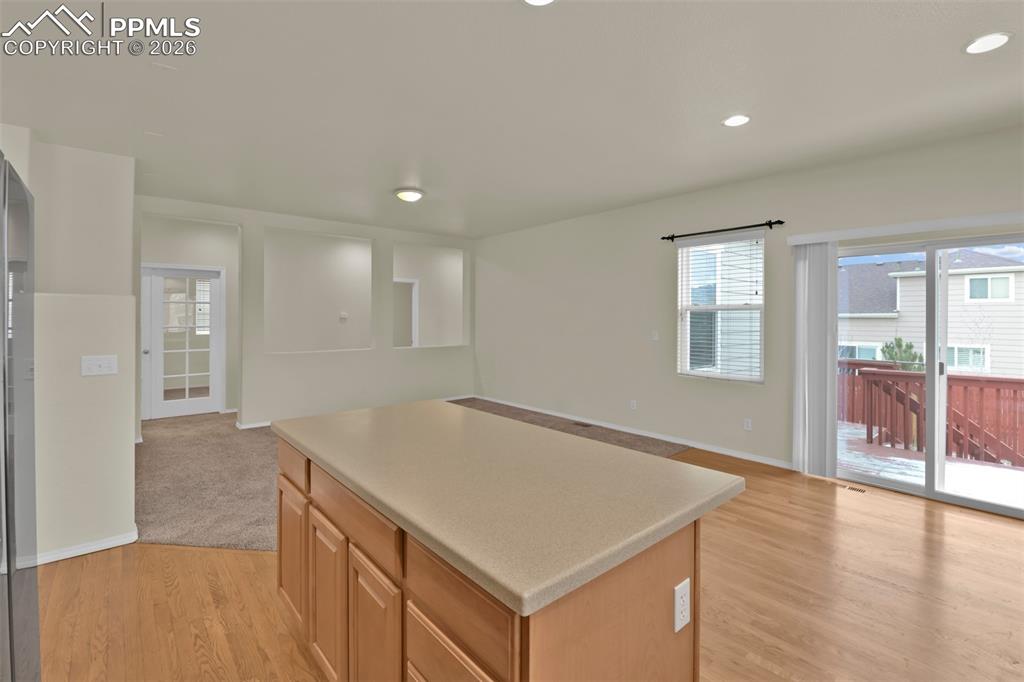 Kitchen with eating nook and walk-out to the deck