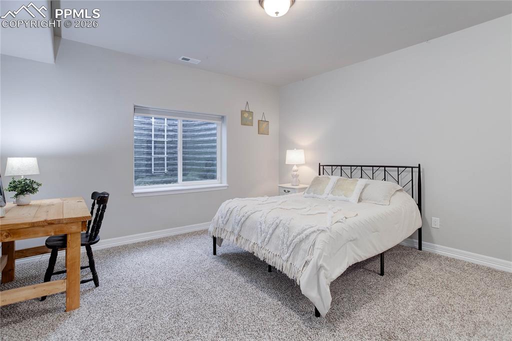 Bedroom 4 w/ en-suite bath - lower level