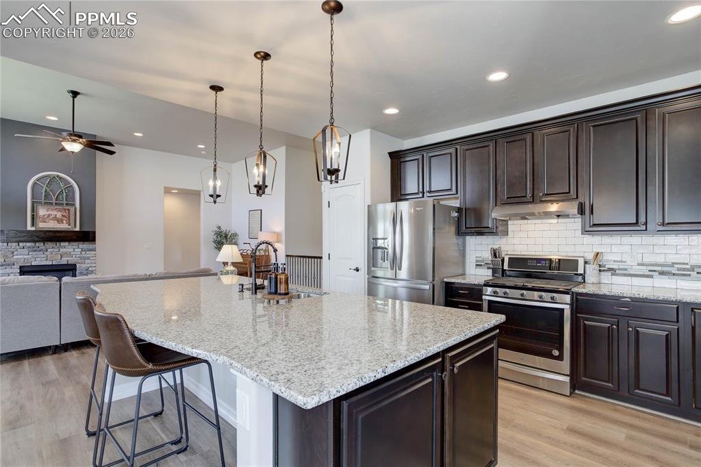 Granite counters & barstool seating