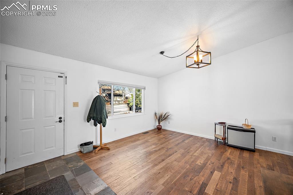 Living room without furniture.  Beautiful wood floors. 