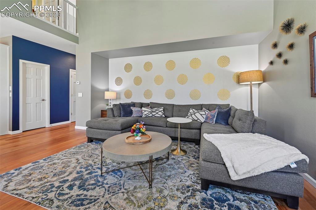 Living area featuring wood finished floors and baseboards