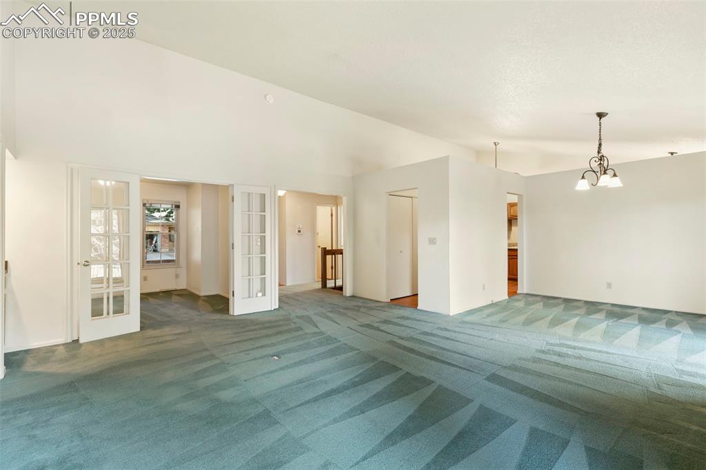 View from living room to dining room and entry