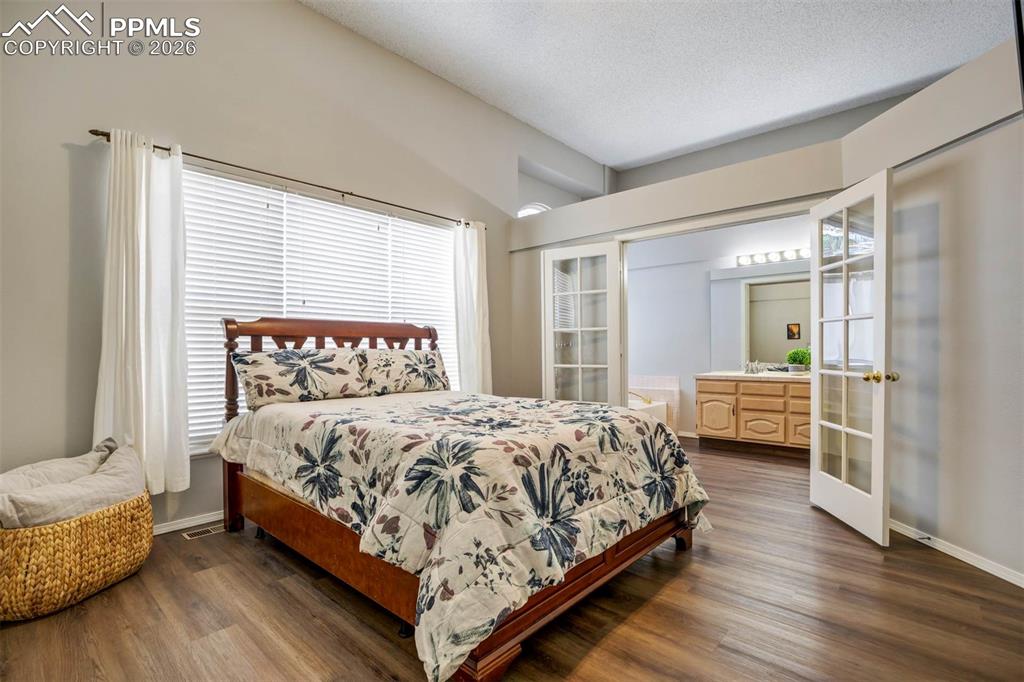 Primary bedroom with bath and walk in closet