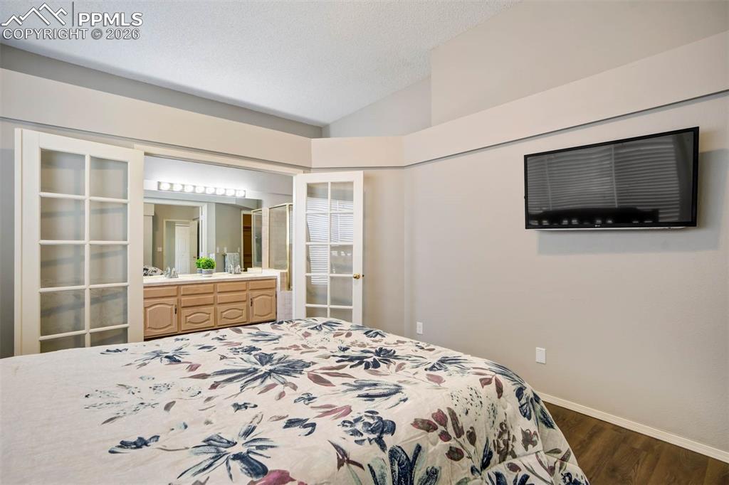 Primary bedroom with bath and walk in closet