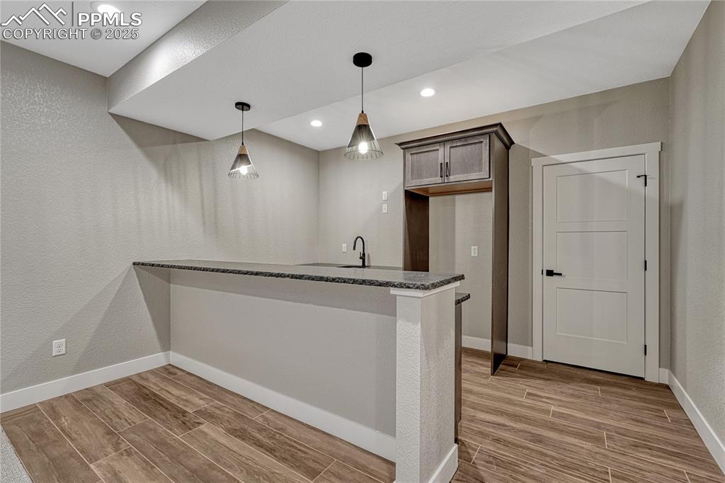 Bastment- Wet Bar- w Leathered Granite Countertops