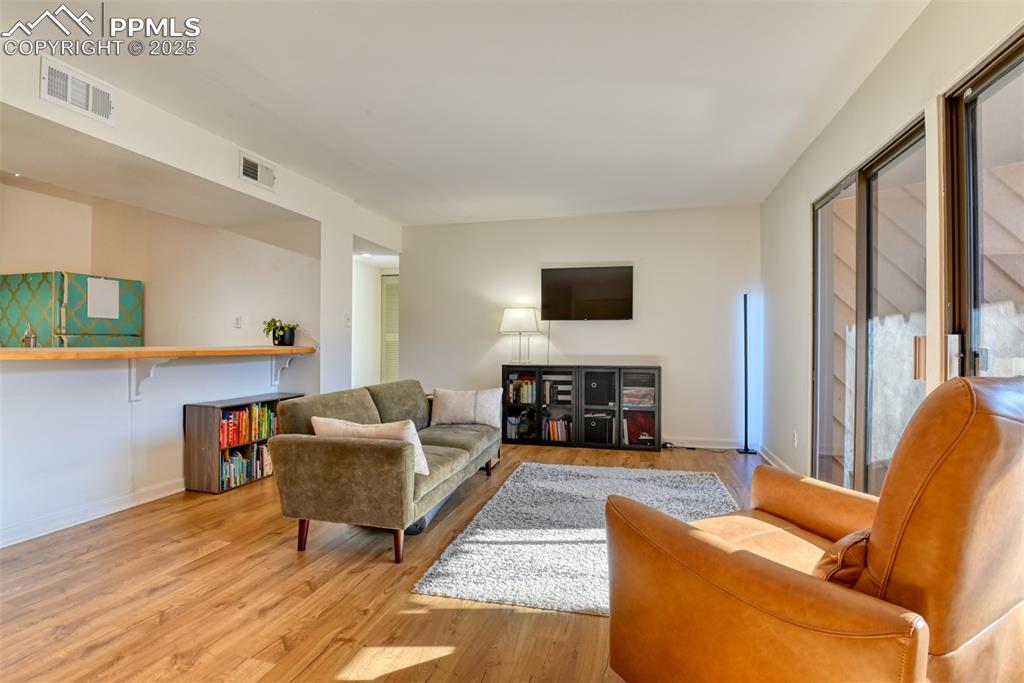 Living room featuring wood finished floors