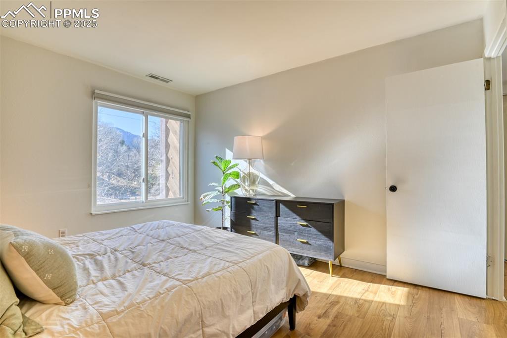 Bedroom with wood finished floors