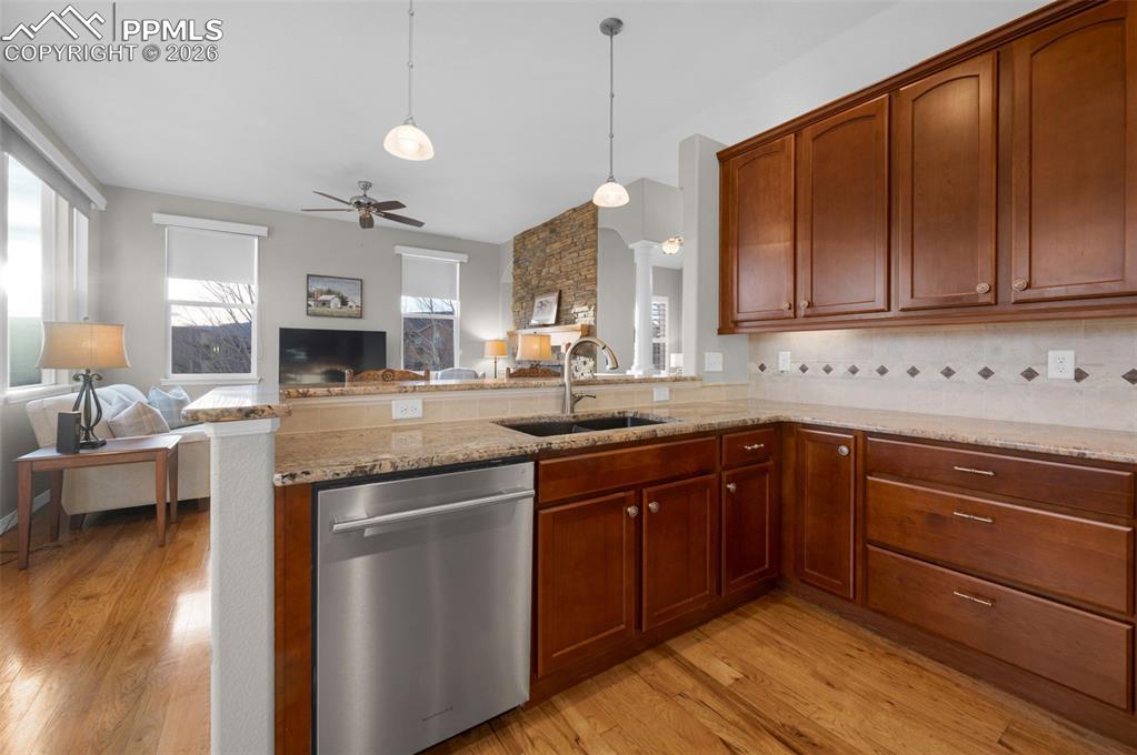 Granite, hickory floors, stainless steel