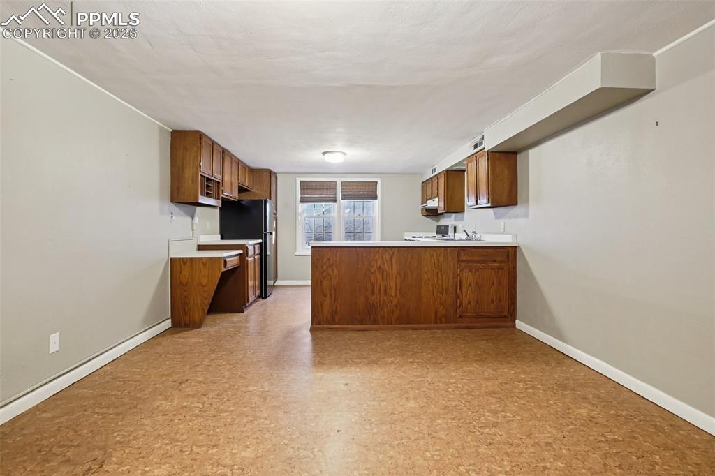 Family room and full kitchen on the lower level