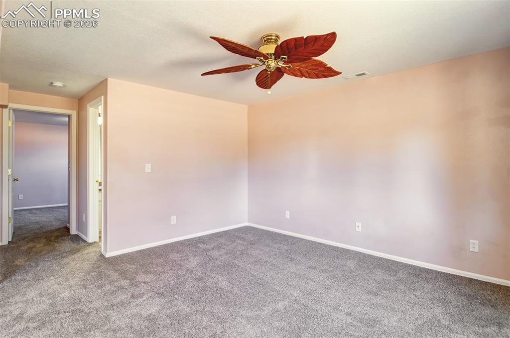 Recreation room in basement with walk out to covered patio