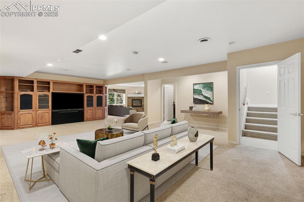 VIRTUAL STAGED DOWNSTAIRS FAMILY ROOM