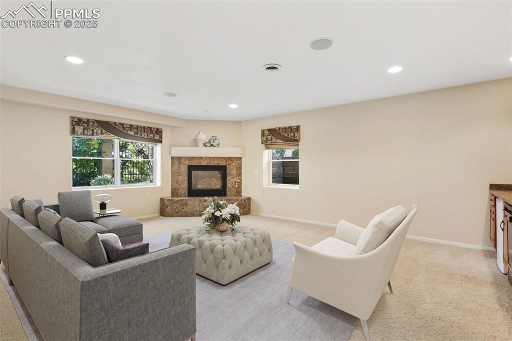 VIRTUAL STAGED FAMILY ROOM 2 of 2 with fireplace