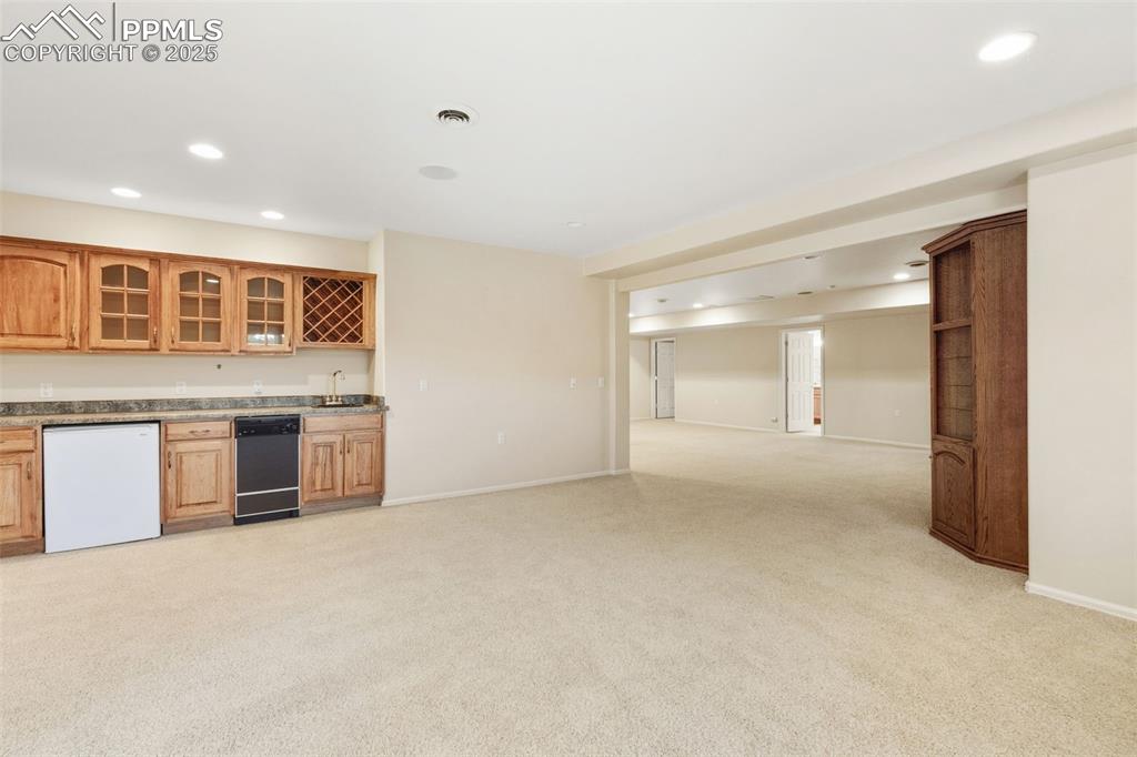 Family Room 2 of 2 Downstairs with Wet bar kitchenette