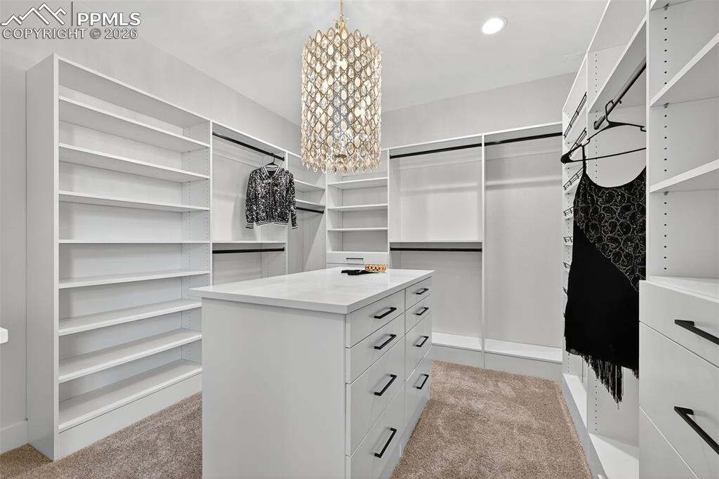 Primary custom walk-in closet 1 of 2 walk-ins