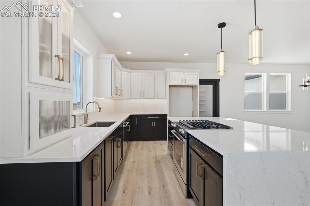 Plenty of counter space with water fall sides.