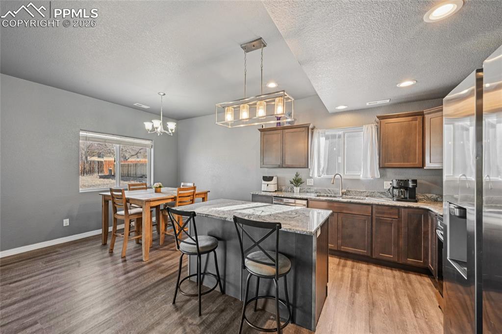 Kithcen island and countertops are granite.